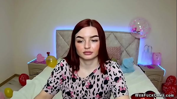 Ginger amateur babe with big tits strips to bra on webcam